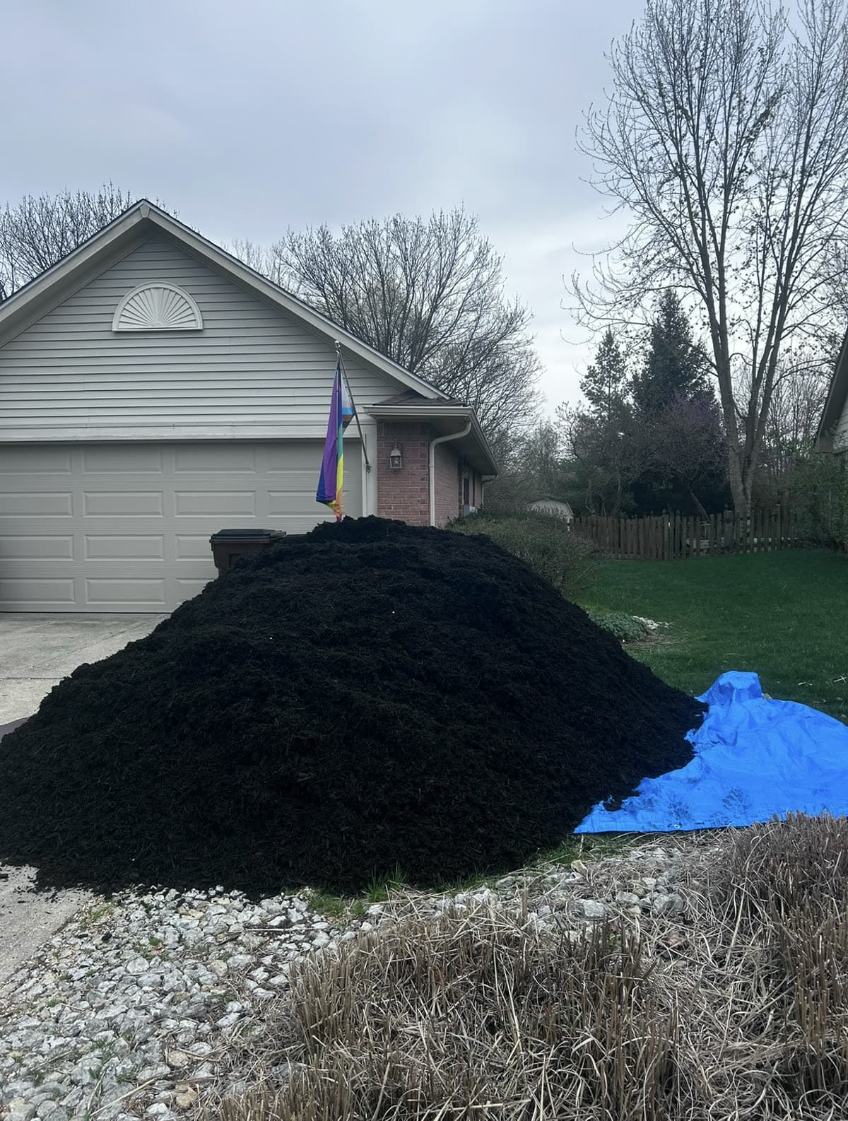 Fresh black mulch delivered to a Beavercreek driveway by LJB
